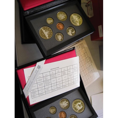 102 - A pair of cased Canadian proof sets in original packaging with original paperwork dating to 1987 and... 