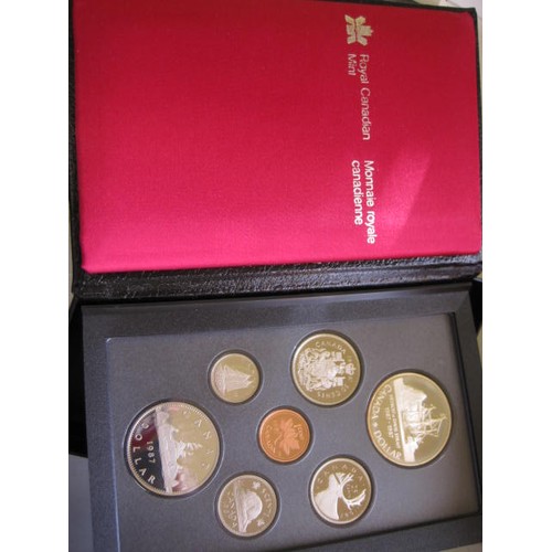 102 - A pair of cased Canadian proof sets in original packaging with original paperwork dating to 1987 and... 