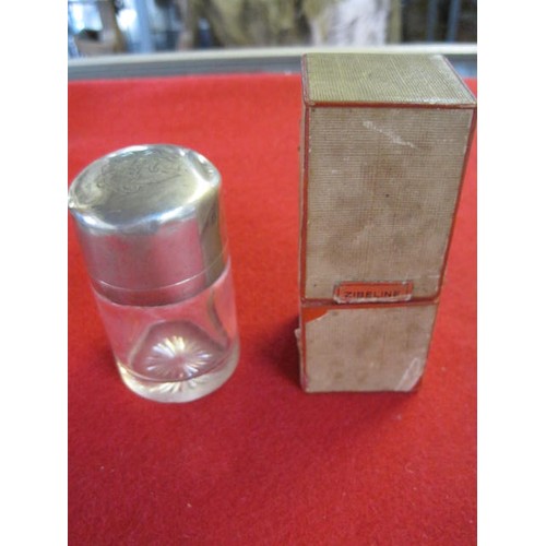 231 - A silver topped scent bottle with etched glass stopper, hallmarked Birmingham 1892, dent to lid, and... 