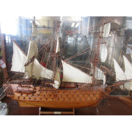 198 - A very large model of HMS Victory in a floor-standing glass case on stand. Approx. 45