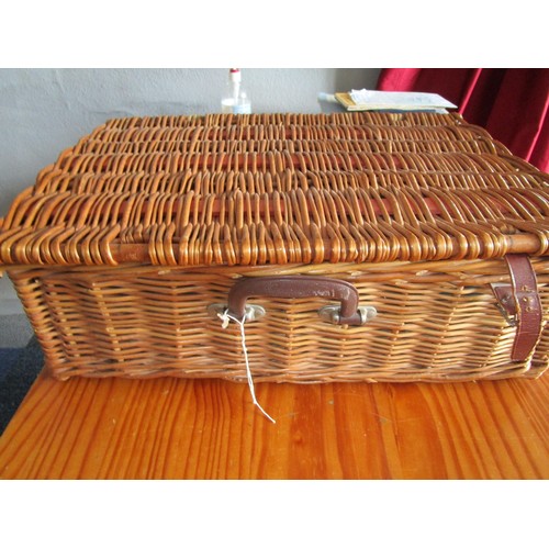 31 - Large wicker picnic basket with place settings etc.some A/F