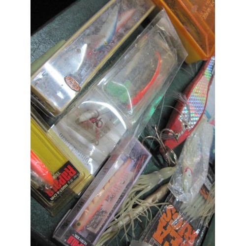 241 - A very large assortment of fishing lures, mainly sea-fishing, some boxed, some vintage, plus associa... 