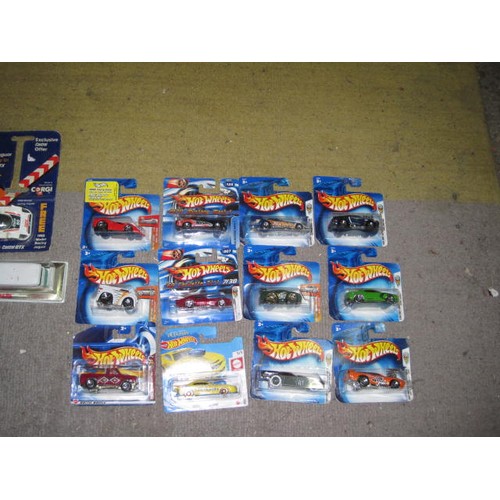 299 - A selection of new and boxed 'Hot Wheels' vehicles, plus 2 others