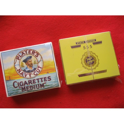 255 - A vintage sealed pack of Player's Navy Cut 'Medium' cigarettes, and a sealed tin of State Express '5... 