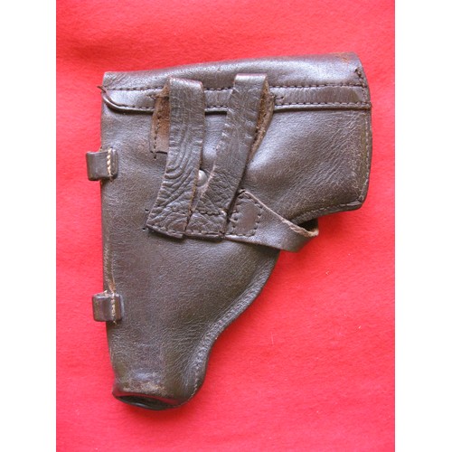 169 - A vintage brown leather pistol holster, possibly for a Walther or equivalent, with external magazine... 