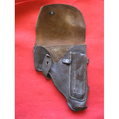 169 - A vintage brown leather pistol holster, possibly for a Walther or equivalent, with external magazine... 