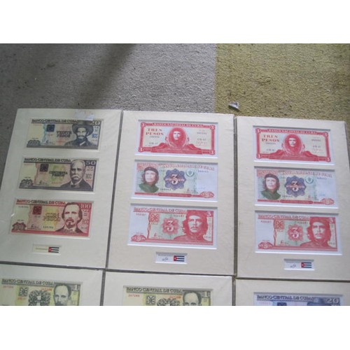 99 - A selection of mounted Cuban banknotes