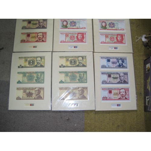 99 - A selection of mounted Cuban banknotes