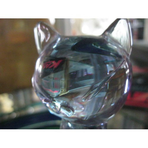 220 - An art glass lilac cat, signed to base (difficult to read, possibly Jeannette L)