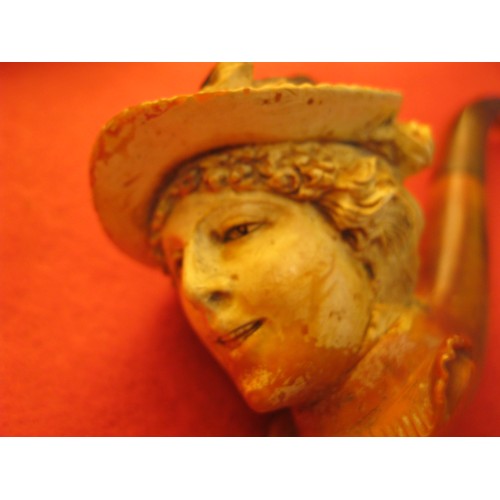 260 - A cased antique smoker's Meerschaum pipe, the bowl carved into the shape of a Victorian lady. Carvin... 