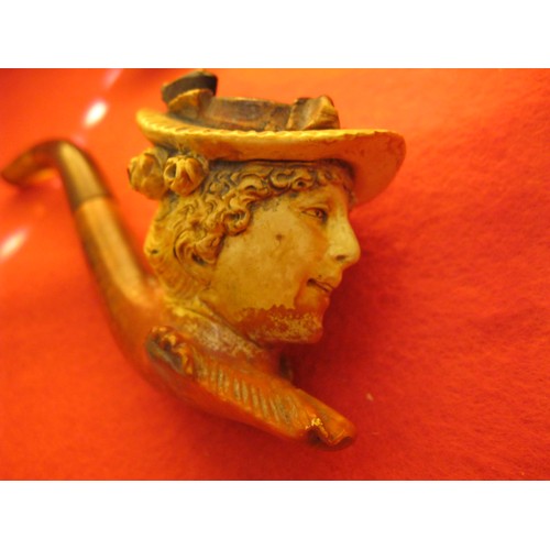 260 - A cased antique smoker's Meerschaum pipe, the bowl carved into the shape of a Victorian lady. Carvin... 