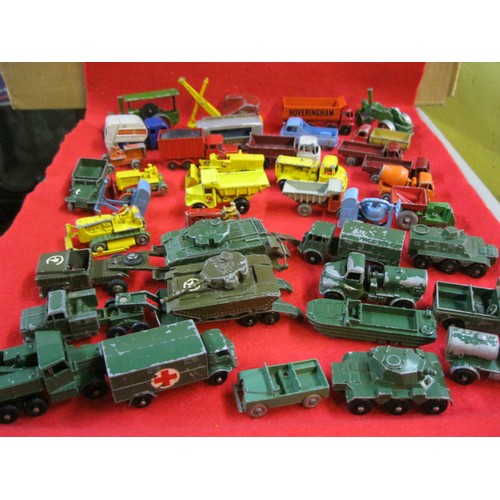 308 - An assortment (approx 40) of vintage Matchbox & Lesney toy cars and trucks comprising military and c... 