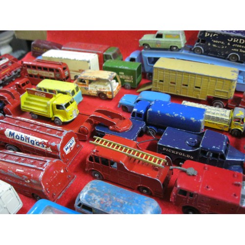 309 - An assortment of vintage Matchbox and Lesney toy cars mainly commercial vehicles including Pickford'... 