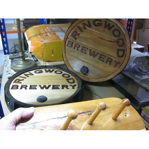 318 - A pair of wooden 'Ringwood Brewery' cask-end style wall plaques and a coat hook