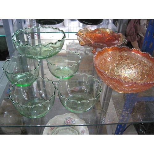 47 - A collection of vintage glassware comprising a celery vase, 2 orange carnival glass dishes and a gre... 