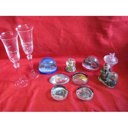 40 - An assortment of snow globes, paperweights and other glassware