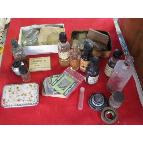 37 - Tin of antique medicine bottles, some with contents, plus a cigarette tin of antique microscope slid... 