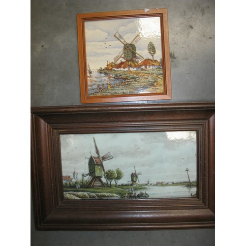 15 - A pair of vintage framed Delftware tiles depicting traditional dutch scenes