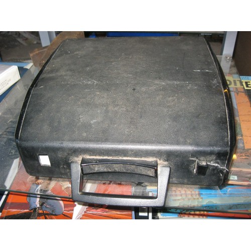 77 - A vintage Brother cased portable typewriter, slight a/f to case