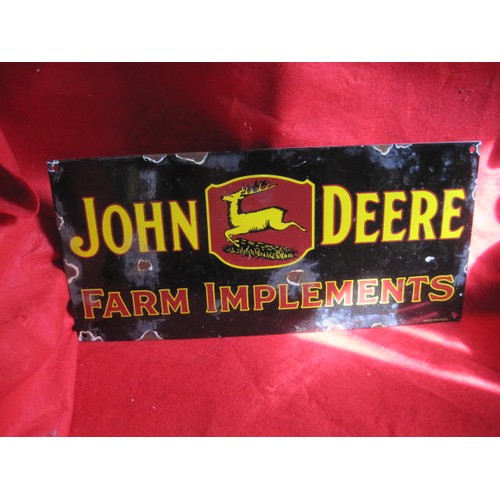 11 - A retro-style John Deere enamel sign