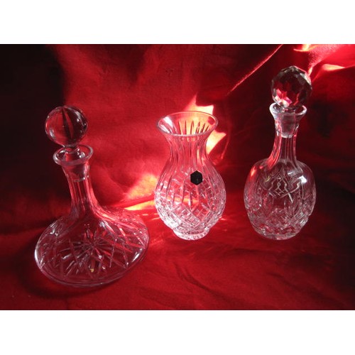 36 - A Stuart crystal vase and a pair of ship's decanters