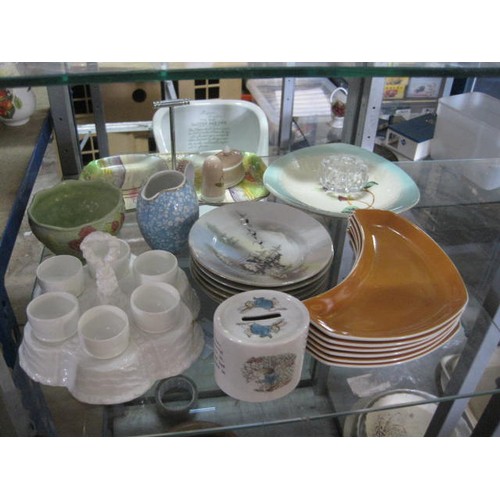 42 - An assortment of china including a Wedgwood Peter Rabbit money box, Poole plates, Burslem and others