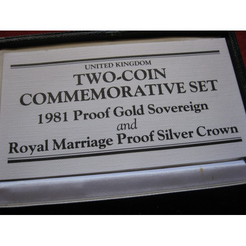 58 - A cased two coin commemorative set by Royal Mint featuring a 1981 proof gold sovereign and a Royal M... 