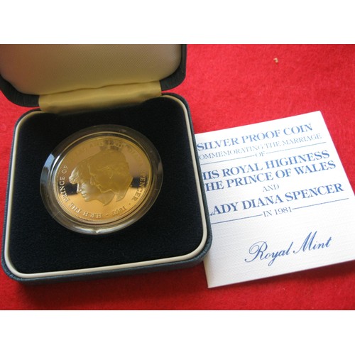 59 - A cased Royal Mint Silver Proof Royal Commemorative Crown for the marriage of Charles & Diana, with ... 