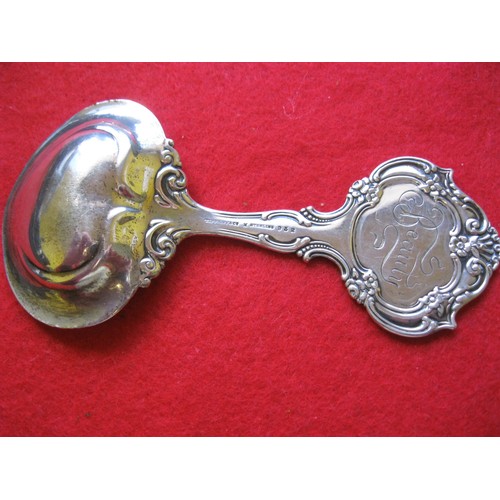 188 - A sterling silver baby's spoon by Tiffany & Co, approx weight 51.6g, marked 'Beauty' on reverse and ... 