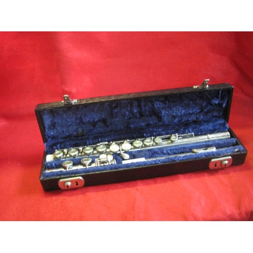 147 - A cased Boosey & Hawkes La Couture 3-section silver plated flute in excellent condition