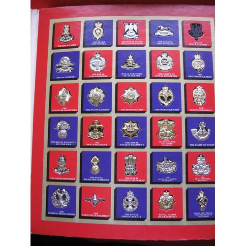 131 - A tub of military cap badges including WW1  (Dorsetshire Regiment, Royal West Kents & more) plus a f... 