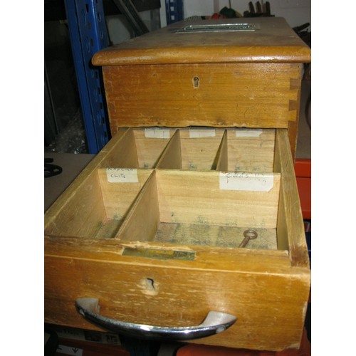 63 - A vintage wooden cash register