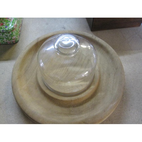 40 - A vintage heavy glass cheese dome on a matching round board of unusual design, plus a small 1970s gl... 