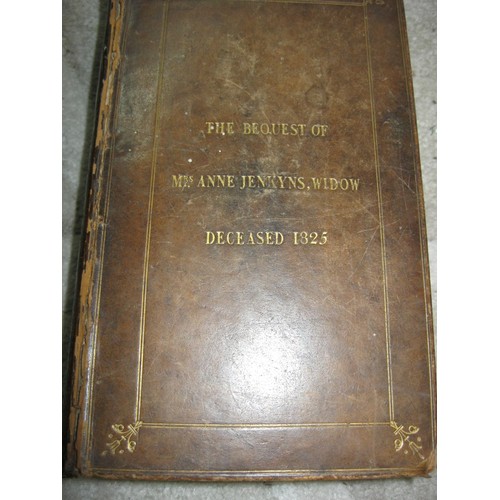 13A - A pair of vintage bibles, one with family history to frontispiece, both dating to the early 19th cen... 