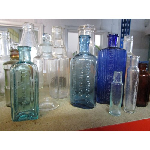 34 - A selection of antique and vintage glass bottles including apothecary and poison bottles, all in goo... 