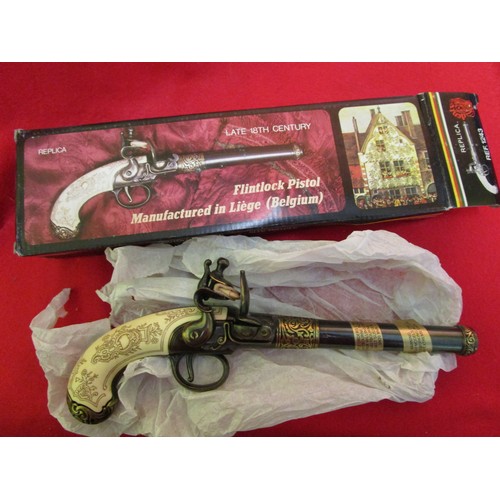 223 - A Denix replica late-18th century Belgian flintlock pistol, boxed and unused