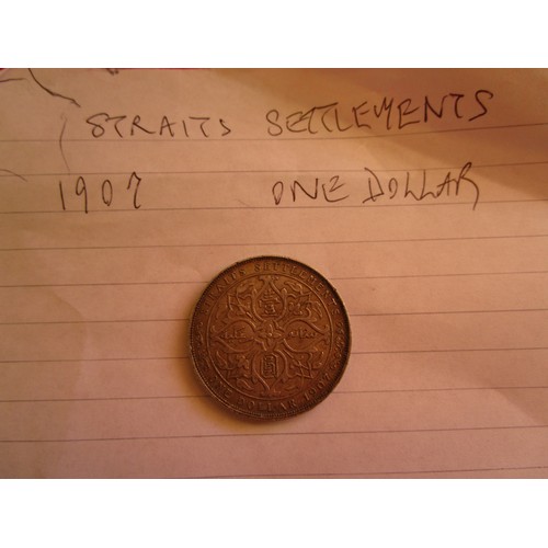 94 - A 1907 Staights Settlement 1 dollar silver coin in EF/XF