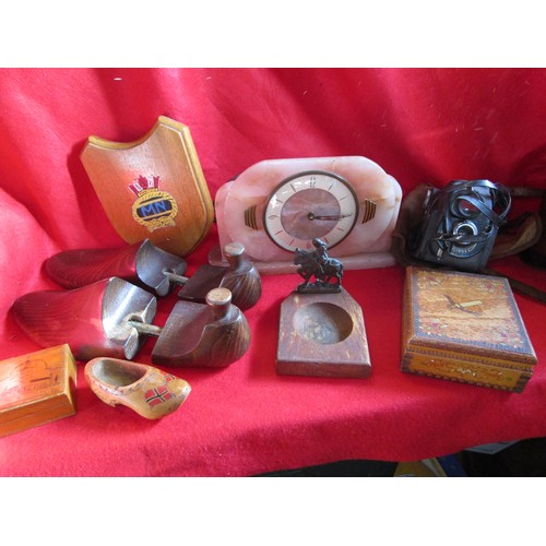 286 - An assortment of treen and other items to include an onyx clock and a camera. Includes an interestin... 