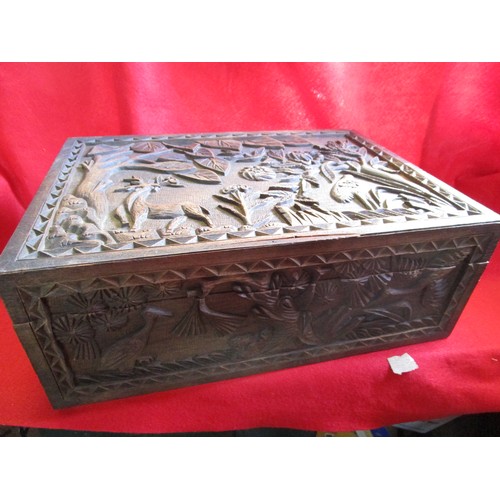 288 - An oriental Indian style carved wooden sewing box in good order