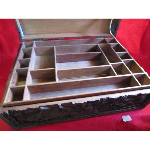 288 - An oriental Indian style carved wooden sewing box in good order