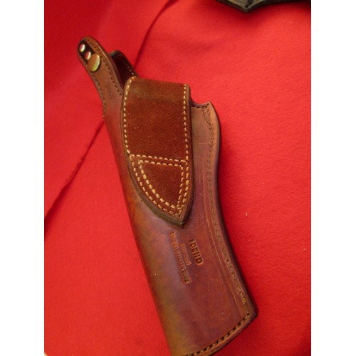 228 - A Jay-Pee Springlock Safety holster with bullet hoops to top and a K-Frame English leather holster p... 