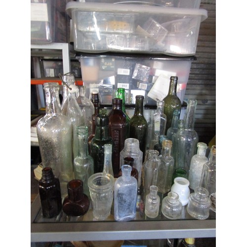 72 - A large selection of antique bottles