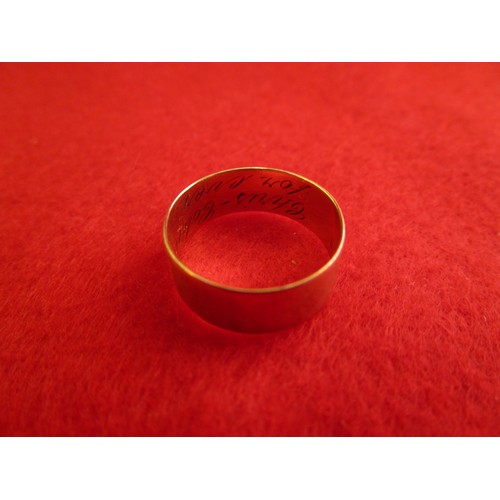 169 - A 9ct gold wedding band, approx weight 2.8g