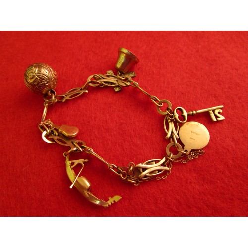 166 - A 9ct gold charm bracelet with mainly 9ct gold charm, approx weight 14.1g