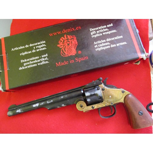 202 - A Denix replica 1869 Smith & Wesson Schofield .45 Calibre Revolver, boxed, minor damp damage to box ... 