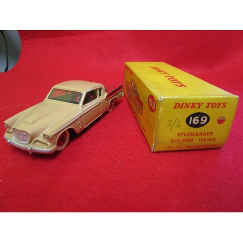 103 - Dinky Studebaker Golden Hawk #169, boxed, immaculate, finished in tan and red