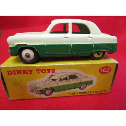 107 - Dinky Toys #162 Ford Zephyr Saloon, boxed, finished in cream over green. Wear and minor damage to bo... 