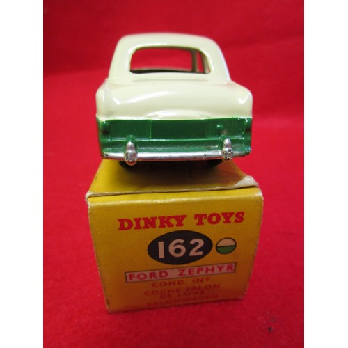 107 - Dinky Toys #162 Ford Zephyr Saloon, boxed, finished in cream over green. Wear and minor damage to bo... 