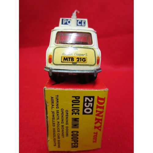 108 - Dinky Toys #250 Police Mini Cooper, very clean, all decals, some bubbling to paint on NSF fender (in... 