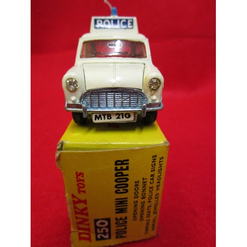 108 - Dinky Toys #250 Police Mini Cooper, very clean, all decals, some bubbling to paint on NSF fender (in... 